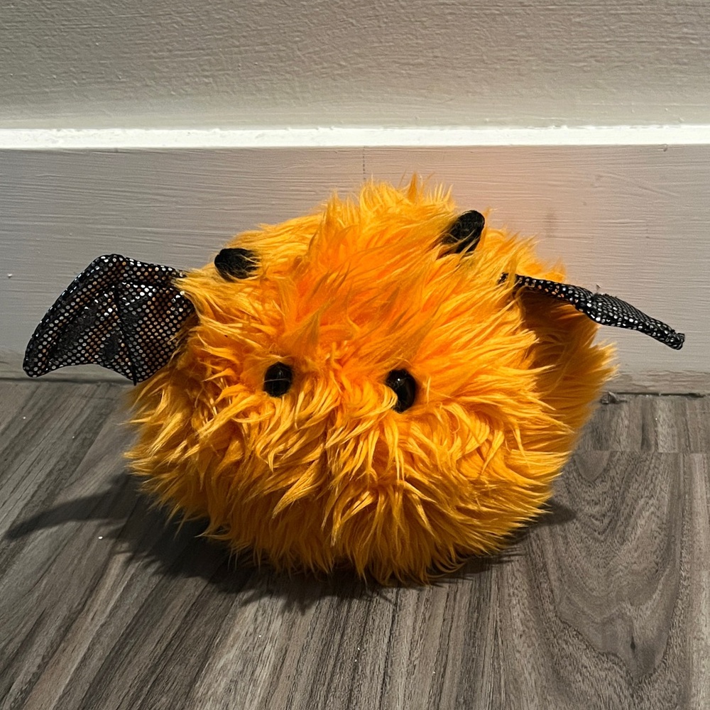 Fluffy Orange Stuffed Animal Toy